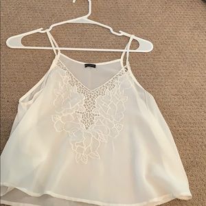 White tank top with floral embroidered design